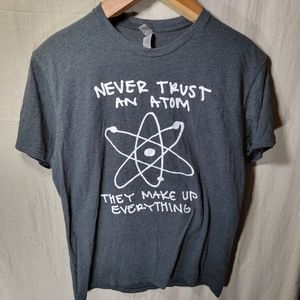 "Never trust an atom. They make up everything." Large unisex t-shirt.